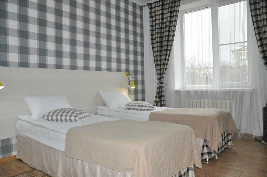 Фотографии номера Двухместный номер с 2 отдельными кроватями в Гостинице Дублин Новороссийск