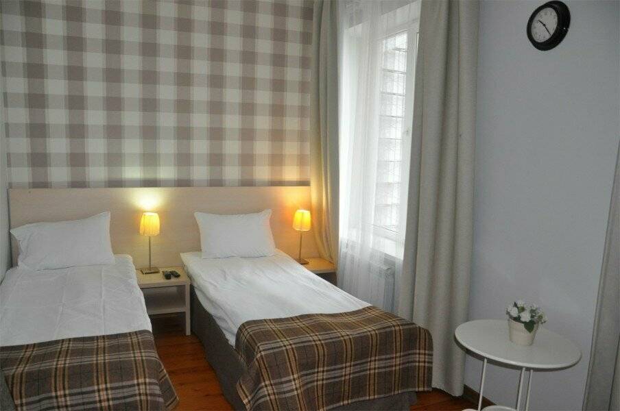 Фотографии номера Двухместный номер с 2 отдельными кроватями в Гостинице Дублин Новороссийск