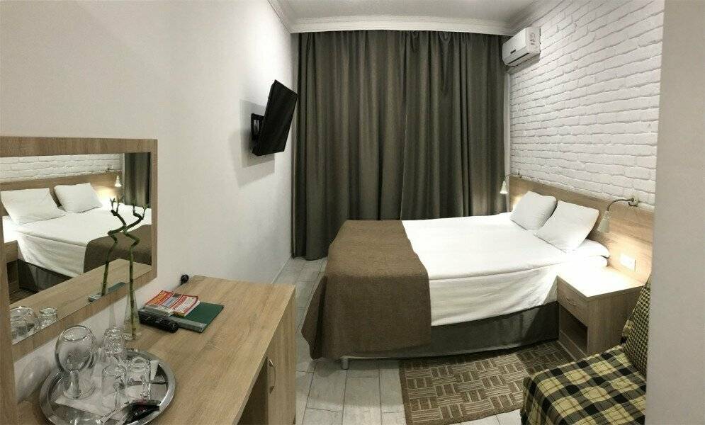 Фотографии номера Классический трехместный номер в Гостинице Дублин Новороссийск