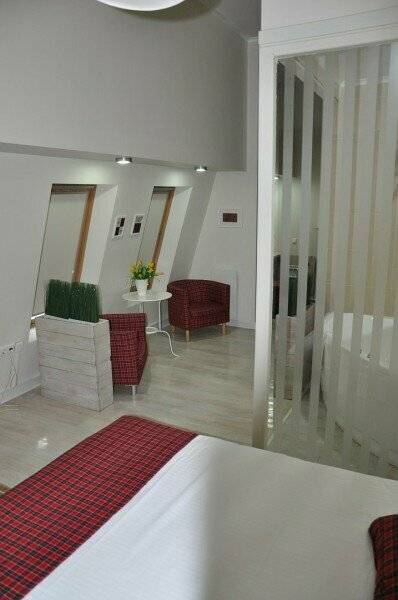 Фотографии номера Двухместный номер с 1 кроватью и гидромассажной ванной в Гостинице Дублин Новороссийск